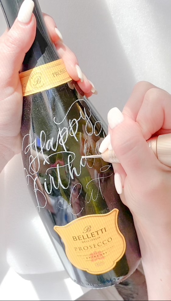 calligraphy engraved wine bottle